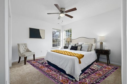 SAFAVIEH Monaco Collection Area Rug - 9' x 12', Violet & Light Blue, Boho Chic Medallion Distressed Design, Non-Shedding & Easy Care, Ideal for High Traffic Areas in Living Room, Bedroom (MNC243L) in White and Yellow Modern Bedroom