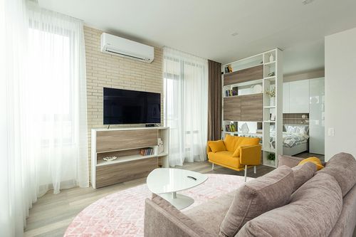 Unique Loom Bohemian Trellis Collection Area Rug - Gypsy (8' x 10' Oval, Dusty Rose/Ivory) in Light Modern Living Room with TV