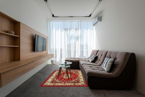 Antep Rugs Kashan King Collection Himalayas Oriental Polypropylene Indoor Area Rug (Maroon/Beige, 5' x 7') in Grey Living Room with Brown Couch