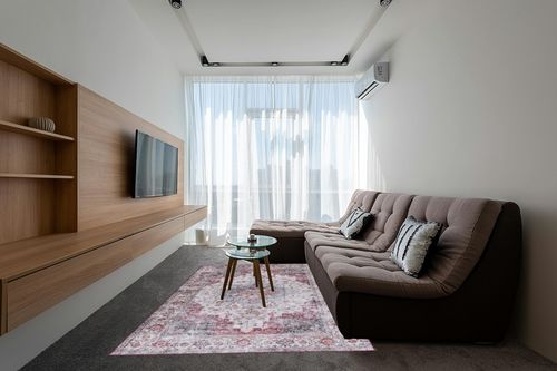 SAFAVIEH Tucson Collection Area Rug - 6' x 9', Beige Green & Rust, Persian Medallion Design, Machine Washable Ideal for High Traffic Areas in Living Room, Bedroom, Dining (TSN105C-6) in Grey Living Room with Brown Couch