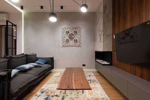 BYYVOO Living Room 6x9 Rug: Modern Abstract Non Slip Area Rug for Bedroom Ultra Soft Stain Resistant Low Pile Indoor Floor Home Decor Carpet 6x9 Gold Multi in Dark Wood Living Room with Black Couch
