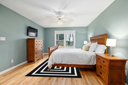 Lanffia Black and White Area Rug 6x9ft Contrasting Geometric Modern Stripe Symmetrical Indoor Outdoor Rug Machine Washable Extra Large Rugs Woven Cotton Floor Carpet for Living Room/Balcony/Backyard in Teal and Orange Wood Bedroom