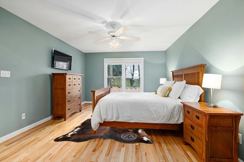 Genuine Brindle Cowhide Rug XL 6 x 7-8 ft. 180 x 240 cm in Teal and Orange Wood Bedroom