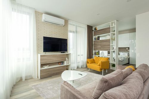 SAFAVIEH Tucson Collection Area Rug - 5' x 8', Blue & Rust, Persian Design, Non-Shedding Machine Washable & Slip Resistant Ideal for High Traffic Areas in Living Room, Bedroom (TSN183M) in Light Modern Living Room with TV