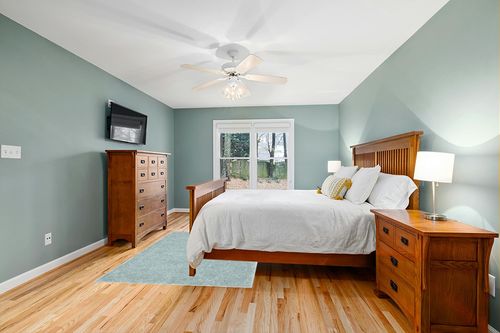 Well Woven Elle Basics | Emerson Shag Seafoam Green | Textured Area Rug (5'3" x 7'3") in Teal and Orange Wood Bedroom