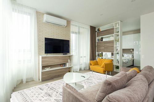 nuLOOM Ansley Moroccan Lattice Tassel Area Rug, 7' 10" x 10' 10", Beige in Light Modern Living Room with TV