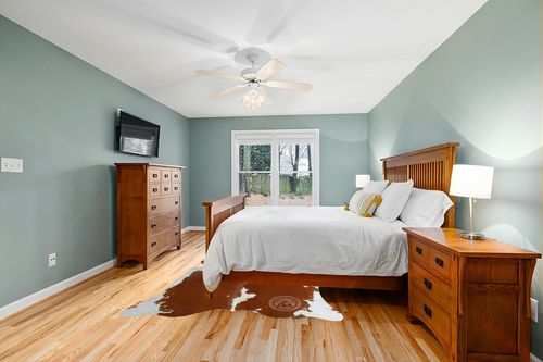 Genuine Brown and White Cowhide Rug XL 6 x 7-8 ft. 180 x 240 cm in Teal and Orange Wood Bedroom