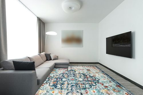 SAFAVIEH Madison Collection Area Rug - 9' x 12', Navy & Light Blue, Boho Chic Medallion Distressed Design, Non-Shedding & Easy Care, Ideal for High Traffic Areas in Living Room, Bedroom (MAD447K) in Modern Living Room with Grey Couch