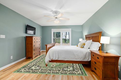 Antep Rugs Oriental 8x10 Traditional Medallion Indoor Area Rug Siesta (Green Beige, 7'10" x 10') in Teal and Orange Wood Bedroom