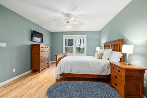 Capel Rugs Claire Oval Braided Area Rug Made in USA Indoor/Outdoor Farmhouse Rug 4' x 6' Blue Jay in Teal and Orange Wood Bedroom