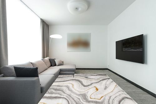 SAFAVIEH Craft Collection Area Rug - 8' x 10', Grey & Gold, Modern Abstract Design, Non-Shedding & Easy Care, Ideal for High Traffic Areas in Living Room, Bedroom (CFT819F) in Modern Living Room with Grey Couch