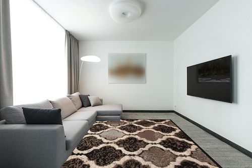 Superior Indoor Large Area Rug, Jute Backed, Perfect for Living/Dining Room, Bedroom, Office, Kitchen, Entryway, Modern Geometric Trellis Floor Decor, Viking Collection, 8' x 10', Chocolate in Modern Living Room with Grey Couch
