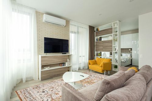 befbee 8x10 Area Rugs for Living Room, Stain Resistant Neutral Washable Rugs for Dining Room, Floral Vintage Non-Slip Thin Large Size Area Rug (Orange/Yellow) in Light Modern Living Room with TV