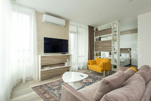 Loloi II Skye Collection SKY-10 SEA / RUST, Traditional 5'-0" x 7'-6" Area Rug in Light Modern Living Room with TV