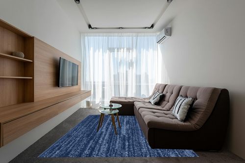 Nourison Essentials Indoor/Outdoor Navy Blue 8' x 10' Area Rug, Easy -Cleaning, Non Shedding, Bed Room, Living Room, Dining Room, Backyard, Deck, Patio (8x10) in Grey Living Room with Brown Couch