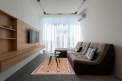 SAFAVIEH Aspen Collection Area Rug - 5' x 8', Red & Yellow, Handmade Boho Wool, Ideal for High Traffic Areas in Living Room, Bedroom (APN149Q) in Grey Living Room with Brown Couch