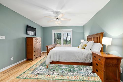 SAFAVIEH Madison Collection Area Rug - 9' x 12', Green & Turquoise, Boho Medallion Distressed Design, Non-Shedding & Easy Care, Ideal for High Traffic Areas in Living Room, Bedroom (MAD474Y) in Teal and Orange Wood Bedroom