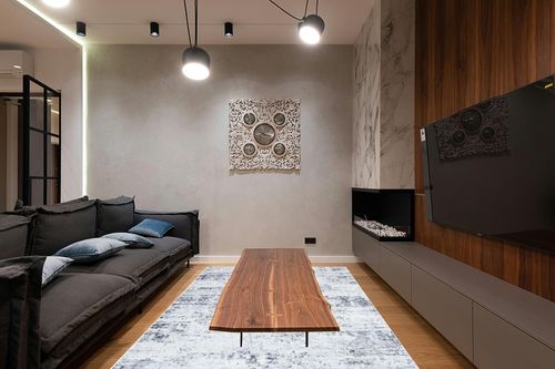 SAFAVIEH Amelia Collection Area Rug - 6' x 9', Ivory & Grey, Modern Abstract Design, Non-Shedding & Easy Care, Ideal for High Traffic Areas in Living Room, Bedroom (ALA700C) in Dark Wood Living Room with Black Couch