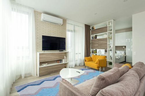 Dash & Albert Safety Net Handwoven Indoor/Outdoor Rug, 8 X 10 Feet, Blue/Grey Geometric Pattern in Light Modern Living Room with TV