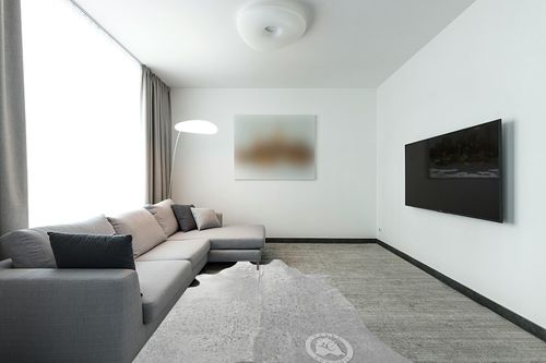 Sunshine Cowhides Genuine Metallic Silver On Off White Cowhide Rug - Luxurious Cow Rug for Bedroom, Living Room, & Home Decor Enthusiasts - Masterpiece of Style & Functionality - 6x8ft (180x240cm) in Modern Living Room with Grey Couch
