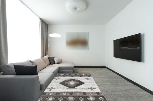 Well Woven Southwestern Rodrigo 5'3" x 7'3" Grey Area Rug in Modern Living Room with Grey Couch