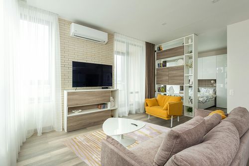 FINOREN Modern Area Rug,Line Swoosh Soft Non-Slip Rug for Bedroom Living Room Hallway Dining Room Office Dorm Room,Washable Low Pile Floor Decor,Child Pet Friendly,Grey Gold,5x7 Feet in Light Modern Living Room with TV