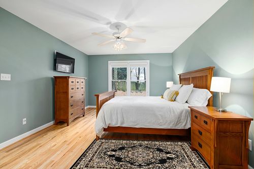 Antep Rugs Oriental 4x6 Traditional Medallion Indoor Area Rug Siesta (Black Beige, 3'11" x 5'11") in Teal and Orange Wood Bedroom