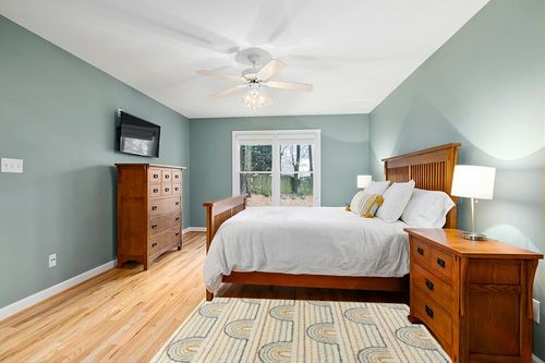 Alec Rainbow Shag Area Rug Mack & Milo Rug Size: Rectangle 4'4" x 6' in Teal and Orange Wood Bedroom