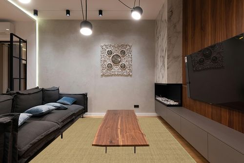 Martha Stewart Collection by SAFAVIEH 9' x 12' Green MSR9501Y Sisal & Jute Area Rug in Dark Wood Living Room with Black Couch