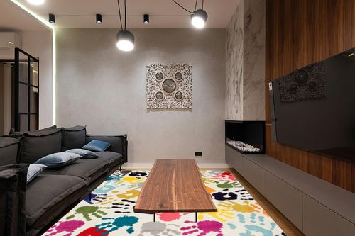 nuLOOM Pinkie Handprint Kids Area Rug, 8x10, Multi in Dark Wood Living Room with Black Couch