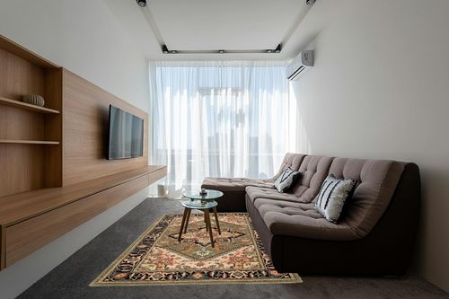 SAFAVIEH Heritage Collection Area Rug - 6' x 9', Green & Light Brown, Handmade Traditional Oriental Wool, Ideal for High Traffic Areas in Living Room, Bedroom (HG625Y) in Grey Living Room with Brown Couch