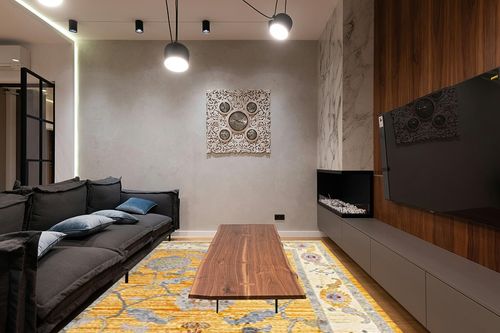 Rugs.com Paragon Collection Rug – 9' x 12' Yellow Medium-Pile Rug Perfect for Living Rooms, Large Dining Rooms, Open Floorplans in Dark Wood Living Room with Black Couch