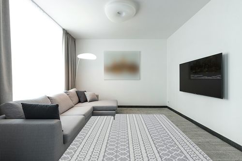 3D Jacquard Woven High-Low Textured Modern Geometric Rug in Modern Living Room with Grey Couch