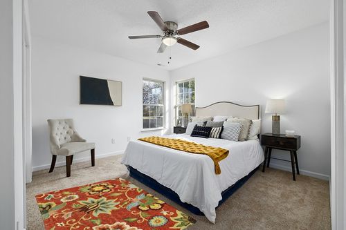 Lahome Red Washable Area Rugs in White and Yellow Modern Bedroom