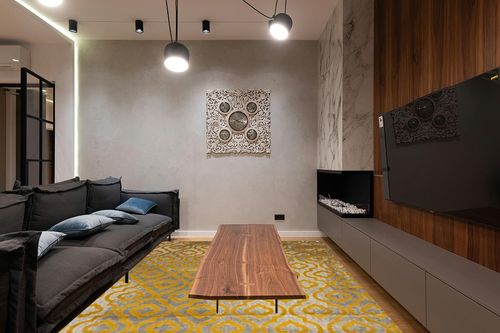 SAFAVIEH Porcello Collection Area Rug - 9' x 12', Light Grey & Yellow, Moroccan Quatrefoil Distressed Design, Non-Shedding & Easy Care, Ideal for High Traffic Areas in Living Room, Bedroom (PRL7734C) in Dark Wood Living Room with Black Couch