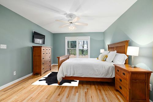 Gaucho Cowhides Solid Black Cowhide Rug - Natural Product in Teal and Orange Wood Bedroom