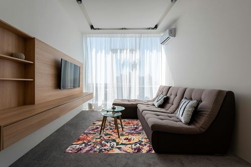 SAFAVIEH Blossom Collection Area Rug - 5' x 8', Blue & Purple, Handmade French Country Floral Wool, Ideal for High Traffic Areas in Living Room, Bedroom (BLM463M) in Grey Living Room with Brown Couch