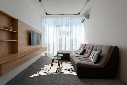 nuLOOM Marcia Machine Washable Faux Cowhide Area Rug, 5' x 6' 7", Black in Grey Living Room with Brown Couch