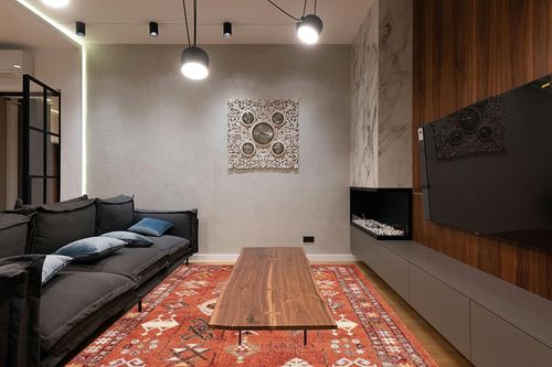 nuLOOM Transitional Tribal Wilma Area Rug, 8x10, Orange in Dark Wood Living Room with Black Couch