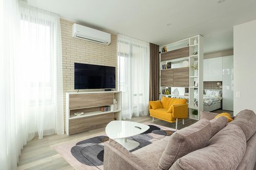 nuLOOM Rylee Abstract Machine Washable Indoor/Outdoor Area Rug, 5x8, Grey in Light Modern Living Room with TV