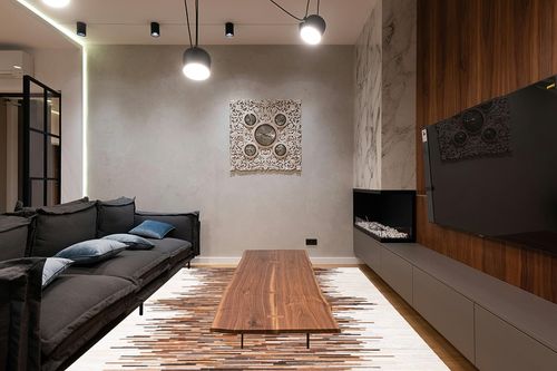 SAFAVIEH Studio Leather Collection 8' x 10' Ivory / Brown STL814A Handmade Mid-Century Modern Leather Area Rug in Dark Wood Living Room with Black Couch