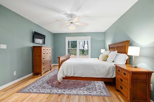 CAROMIO Vintage Area Rug in Teal and Orange Wood Bedroom