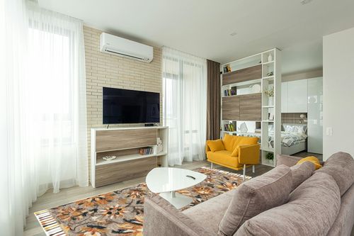 Safavieh Aspen Collection Area Rug - 8' x 10', Grey & Brown, Handmade Floral Tassel Wool, Ideal for High Traffic Areas in Living Room, Bedroom (APN139G) in Light Modern Living Room with TV