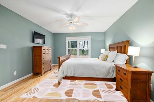 HOMBYS 9x12ft Boho Area Rug for Living Room Bedroom, Large Floor Carpet for Indoor Office Dining Room, Modern Home Deco Non-Shedding, Orange, Machine Washable in Teal and Orange Wood Bedroom