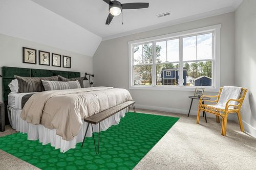 Garland Rug Garden Trellis 9 ft. x 12 ft. Indoor/Outdoor Area Rug Green in Grey Traditional Bedroom with King Bed