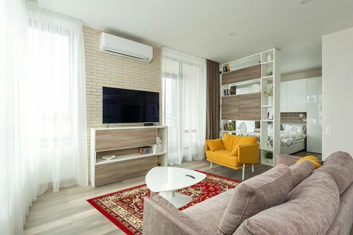 Antep Rugs Kashan King Collection Himalayas Oriental Polypropylene Indoor Area Rug (Maroon/Beige, 5' x 7') in Light Modern Living Room with TV