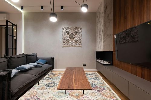 SAFAVIEH Madison Collection Area Rug - 9' x 12', Cream & Multi, Boho Chic Distressed Design, Non-Shedding & Easy Care, Ideal for High Traffic Areas in Living Room, Bedroom (MAD611B) in Dark Wood Living Room with Black Couch