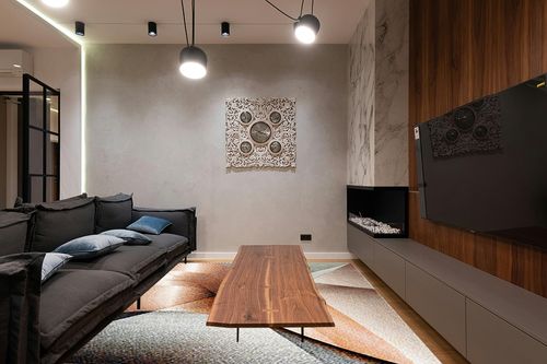 SAFAVIEH Hollywood Collection Area Rug - 8' x 10', Grey & Orange, Mid-Century Modern Design, Non-Shedding & Easy Care, Ideal for High Traffic Areas in Living Room, Bedroom (HLW715P) in Dark Wood Living Room with Black Couch