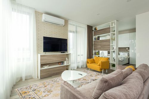 Artistic Weavers Delney Oriental Area Rug,7'10" x 10',Yellow in Light Modern Living Room with TV