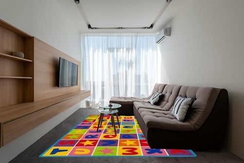 Champion Rugs Kids Area Rug ALPHABET Learning/ Playtime Carpet (8 Feet X 10 Feet) in Grey Living Room with Brown Couch